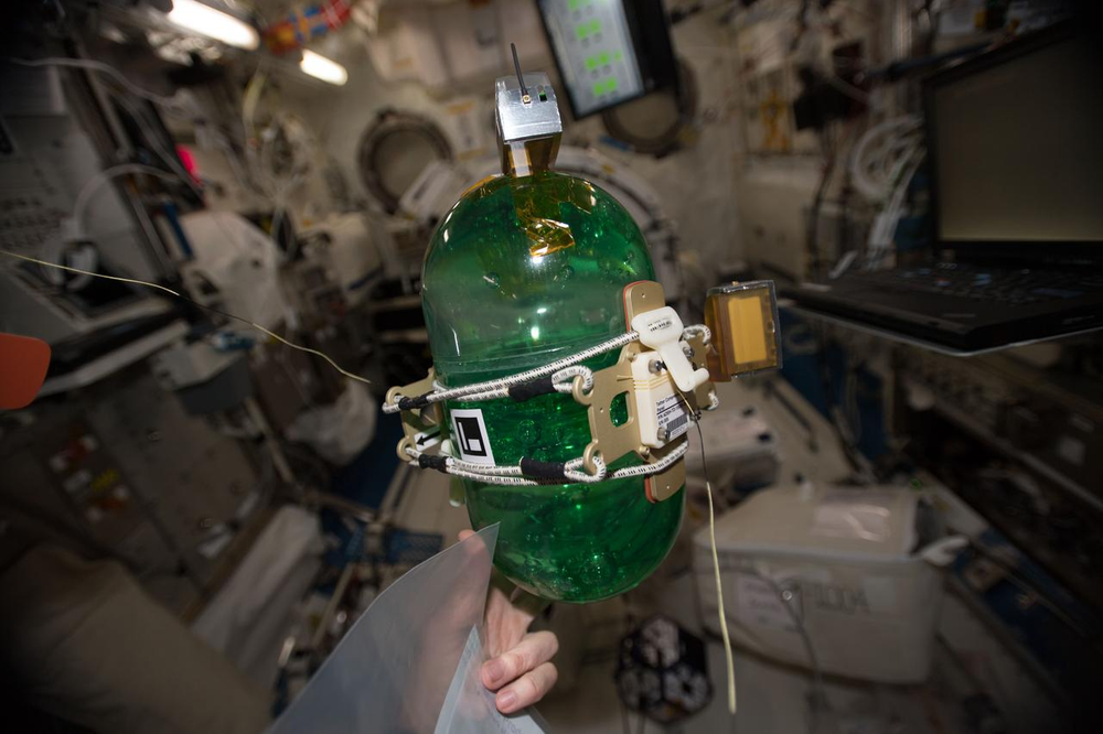 A view taken aboard the International Space Station during the set up of the SPHERES Tether Slosh experiment hardware.Credit: NASA/Ricky Arnold 